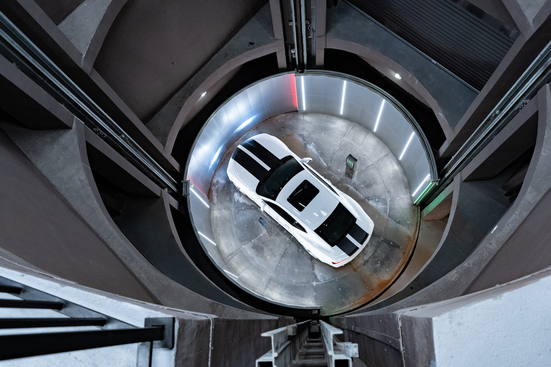 Вращающийся на 360° автомобильный лифт для подземного паркинга | PANDA LIFT - TITAN Rotary